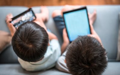 kids playing with smartphone and tablet