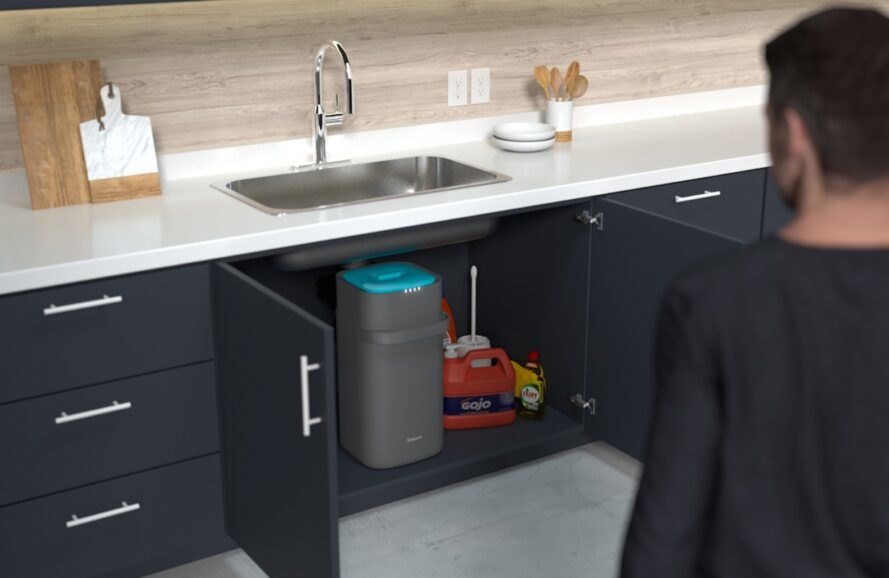 gray and blue compost bin under kitchen sink