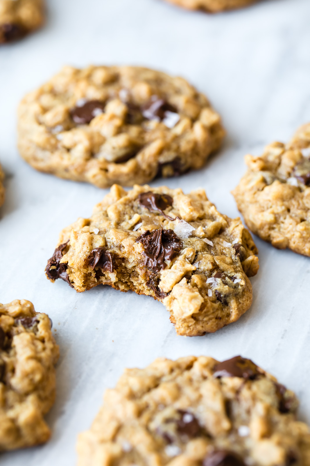 peanut butter oatmeal chocolate chip cookies on a marble board