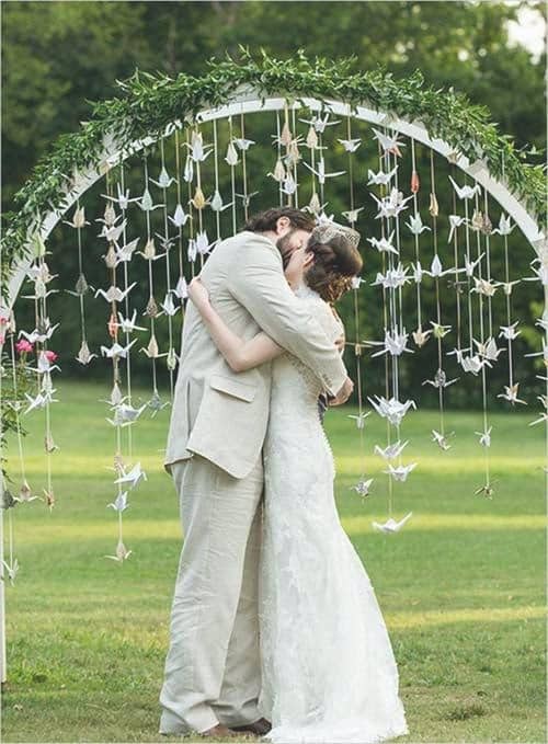 a photo of a wedding going on in the open air