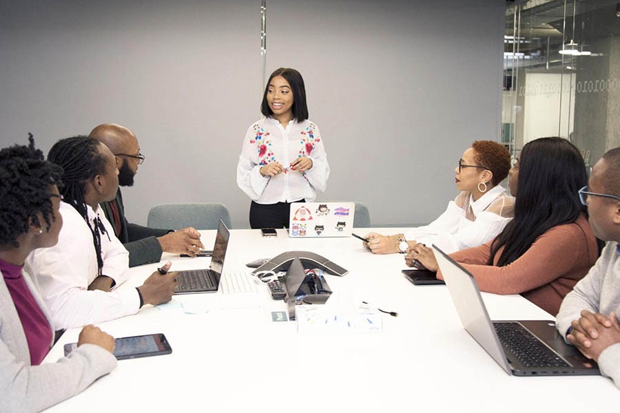 Group of Black co-workers having a meeting.