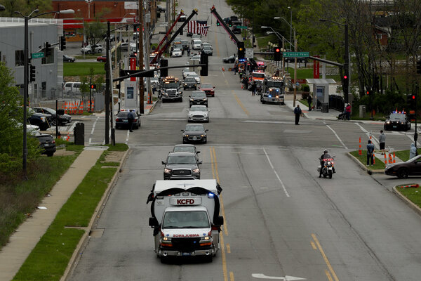 A funeral procession in April for a Kansas City firefighter who died of the coronavirus. More than 200 members of the city&rsquo;s fire department have tested positive since the pandemic began.