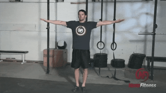 Arm circles are a great way to warm-up for your at-home workout.