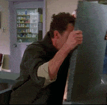 A man hitting his head over and over.